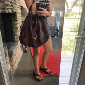 Rare Authentic Gucci hobo gold stirrup detail